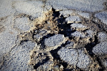 An Image of a road, sand