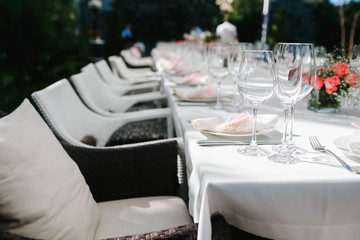 Crystal dishes on a restaurant table, open background.