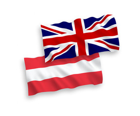 National vector fabric wave flags of Austria and Great Britain isolated on white background. 1 to 2 proportion.