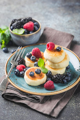 Cottage cheese pancakes with berries. Healthy Breakfast.