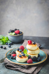 Cottage cheese pancakes with berries. Healthy Breakfast.