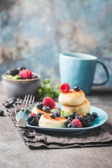 Cottage cheese pancakes with berries. Healthy Breakfast.