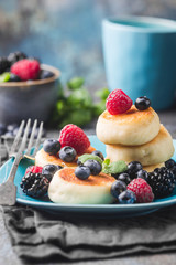 Cottage cheese pancakes with berries. Healthy Breakfast.