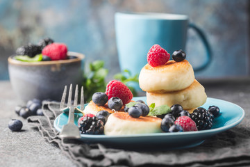 Cottage cheese pancakes with berries. Healthy Breakfast.