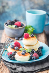 Cottage cheese pancakes with berries. Healthy Breakfast.