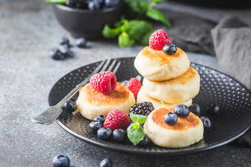 Cottage cheese pancakes with berries. Healthy Breakfast.