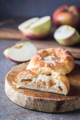 Naklejka na ściany i meble Fresh homemade small patties with apple stuffing.