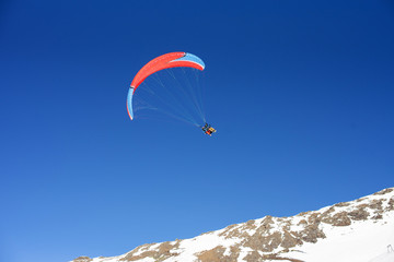 Paragliding, cloudless blue sky