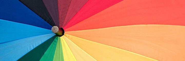 Close-up of a rainbow colored umbrella