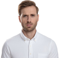 Fototapeta premium young casual man with a confused face