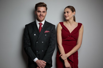 smiling elegant man and woman