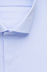 blue shirt, detailed close-up collar and button, top view