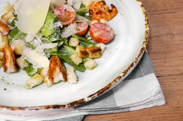Shrimp Caesar salad with Parmesan cheese, croutons and lettuce