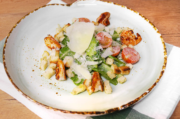 Shrimp Caesar salad with Parmesan cheese, croutons and lettuce