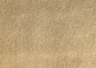 The background of beige suede leather