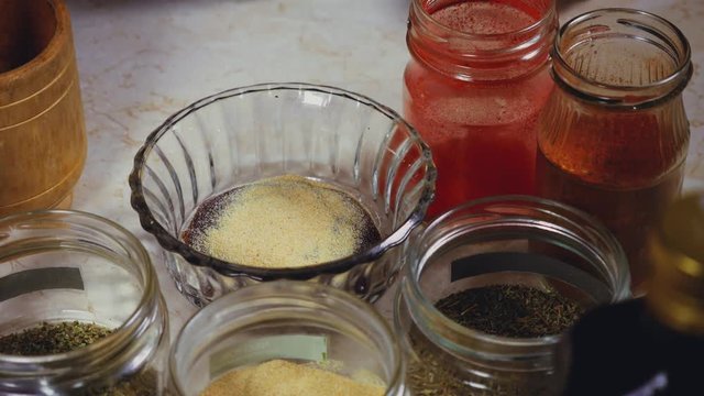 the process of crafting a barbecue sauce with spices