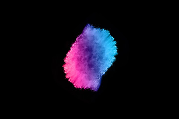 abstract colored dust explosion on a black background.abstract powder splatted background,Freeze...