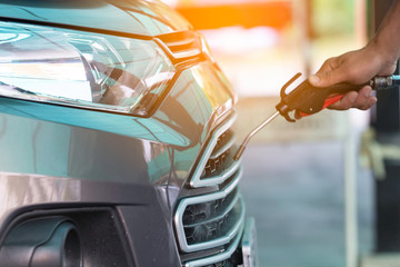 Car washing in car wash service shop.