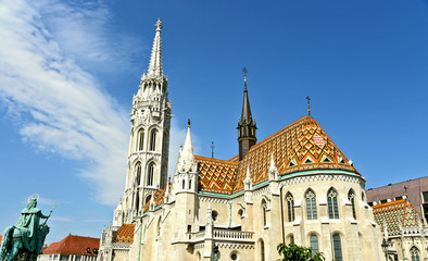 Matthias Church in Budapest with blue sky.