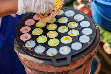 kind of Thai sweetmeat . Coconut milk mix with powder fried dessert. Making of Thai sweetmeat khanomkhrok. Local Thai food, Kind of thai sweetmeat, coconut pudding, sweetmeat. kind, dessert.