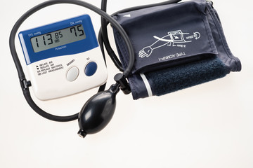 Tonometer - a diagnostic device for determining and monitoring such vital functions of the human body as blood pressure and pulse rate on a white background