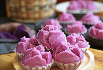 Purple Sweet Potato Steam Muffins on wooden broad..purple sweet potatoes desert menu.