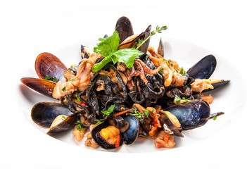 Tagliolini. Pasta with seafood with spicy sauce