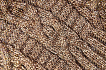 Light brown woolen knitted fabric texture