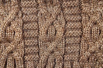 Light brown woolen knitted fabric texture