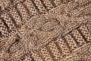 Light brown woolen knitted fabric texture