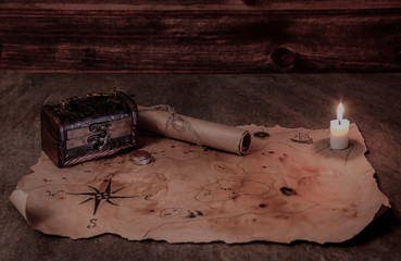 old pirate table, small chest and roll, white candle, real flame, map of treasures