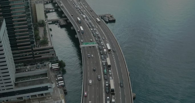 Aerial view of road in Hong Kong financial and business district, China, Asia.  Cars on the bridge. 