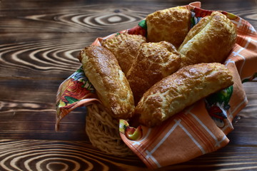 closeup fresh home made tasty pastry in a plate on a dark wooden table