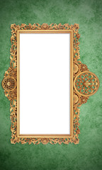 Gold Color Antique Vintage Classic Baroque Stylish Empty Photo Painting Frame in Grunge and Retro Background for Home Interior and Garden Furniture made from Wood and Metal