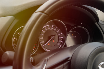 Speedometer Gauge on Dashboard in The Car