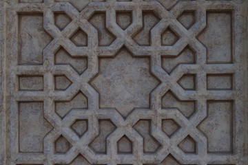 traditional, octagonal, convex ornament on the wall