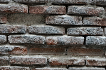 expoxed facing street old brick pattern