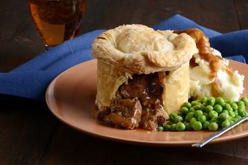 beef meat pie with vegetables and gravy