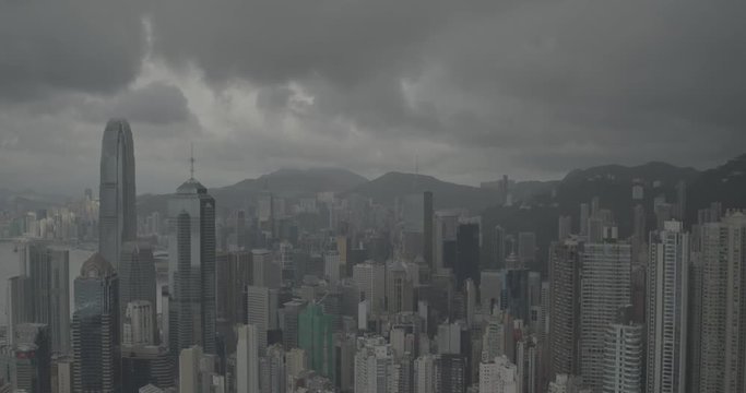 Drone aerial shot of modern skyscrapers in Hong Kong City. Hong Kong is a popular tourist travel destination in Asia. China. Storm clouds. DJI Inspire 2 X7