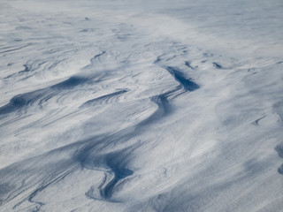Patterns in the snow after a blizzard. Snow after a blizzard. Snow drift.
