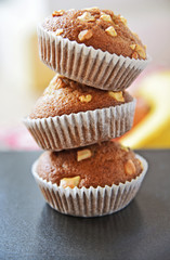 Banana muffins stack or banana cup cake topping with cashew nut