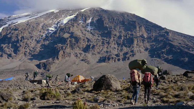 Walkers going to the summit of Mount Kilimanjaro, Tanzania