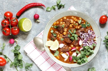 Beef Pozole. with beef and chickpeas. festive Mexican rich soup.
