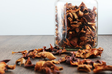Dried fruit in can on a wooden table