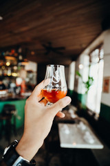 Drink Whiskey in bar in Panama City