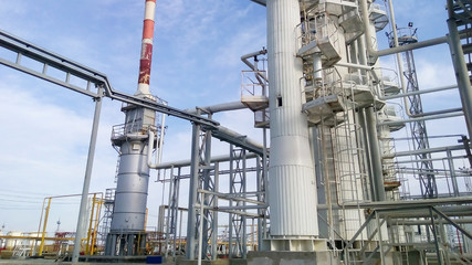 Fototapeta na wymiar Distillation columns and heating furnace