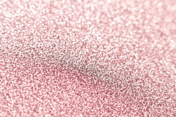Pink glitter texture Festive sparkling sequins background closeup. Wpaper for Valentine, New Year or Christmas Holidays.