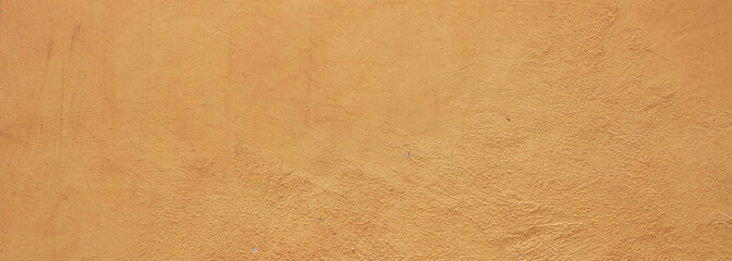 Painted wall texture background, yellow color, banner
