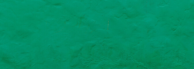 Painted wall texture background, green color, banner