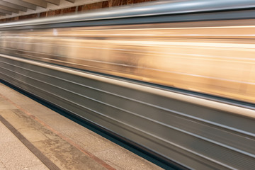 Fototapeta premium The train moves to the subway as a background